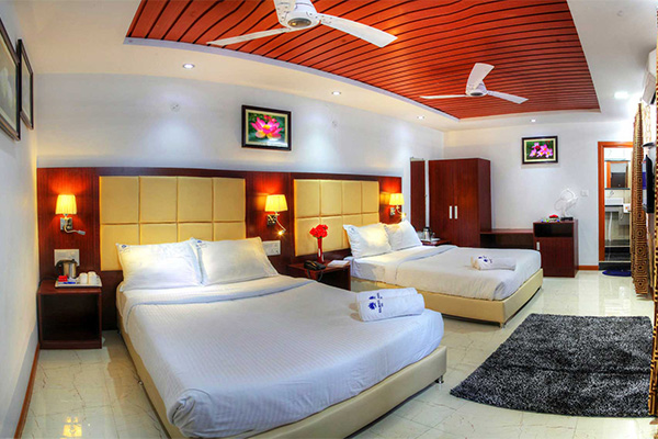 Rajmahalinn-QueenFourBeddedRoom